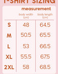 A T-shirt Size guide. The small size suits body width 48 centimeters and body length 64.5 centimeters. Medium size suits body width 50.5 centimeters and body length 65.5 centimeters. The large size suits a body width of 53cm and a body length of 66.5cm. The extra large size suits a body width of 55.5cm and a body length of 67.5cm. The two extra large suits a body width of 58cm and a body length of 68.5cm.