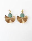 A pair of stud dangle earrings sit against a white background. They feature a duckegg enamel connector dot and a textured brass fan piece.